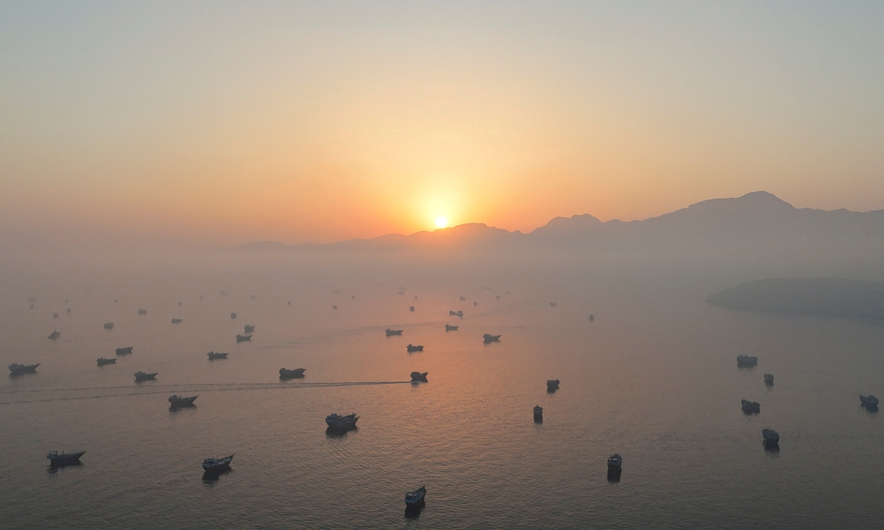 FILE PHOTO: A drone view shows vessels in the Strait of Hormuz, as seen from Musandam, Oman, June 15, 2026. REUTERS/Stringer/File Photo/File Photo