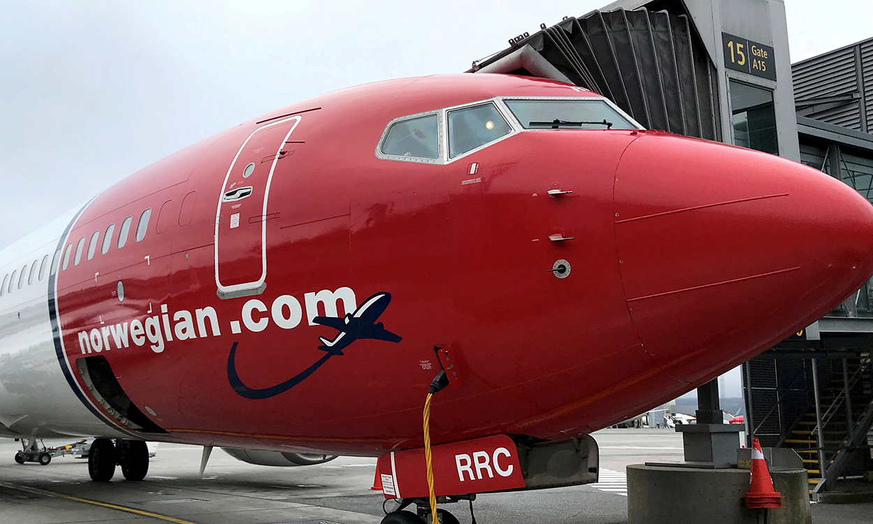FILE PHOTO: FILE PHOTO: A Norwegian Air plane is refuelled at Oslo Gardermoen airport, Norway November 7, 2019.REUTERS/Lefteris Karagiannopoulos/File Photo
